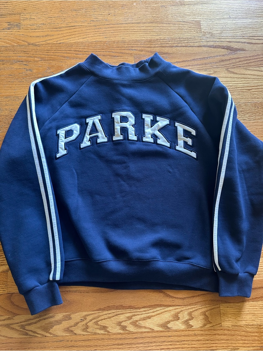 Parke Blue Sweatshirt with stripes on sleeves. X/XL new, never worn!!